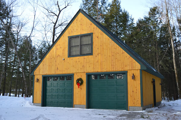 Custom detached garage by G & L Contrating.